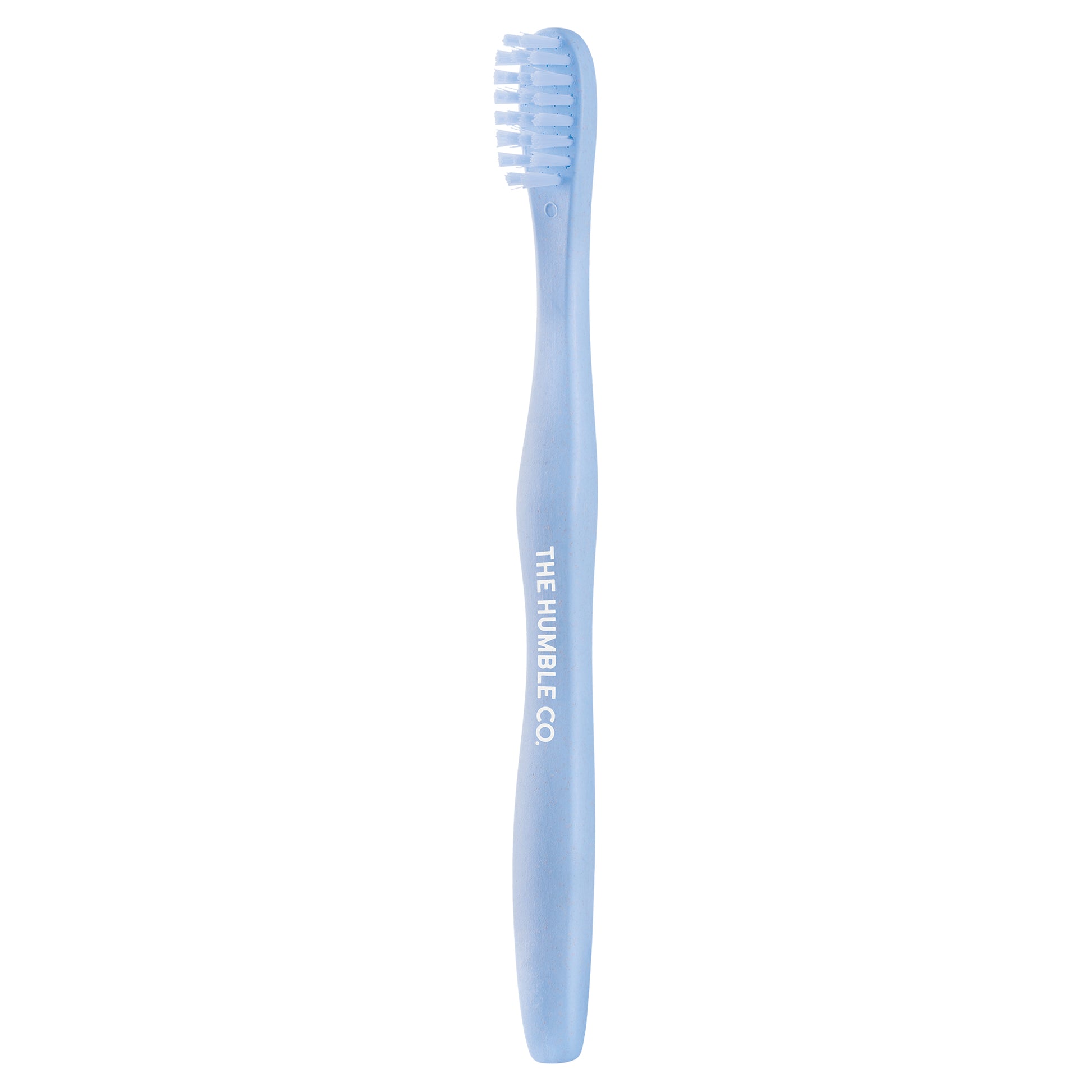 Escova de dentes de criança de base vegetal da The Humble Co. Cerdas sem BPA. Azul. Embalagem.