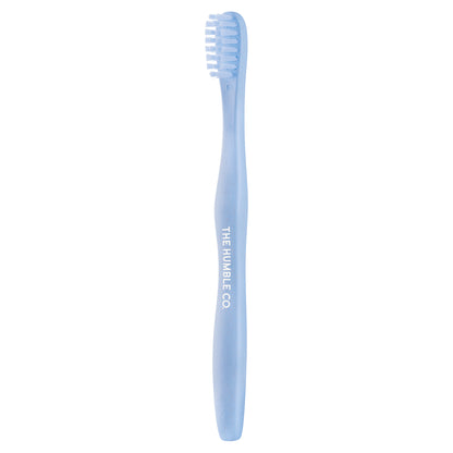 Escova de dentes de criança de base vegetal da The Humble Co. Cerdas sem BPA. Azul. Embalagem.